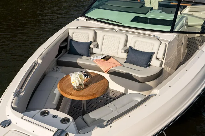  Yacht Photos Pics Manufacturer Provided Image: Luxurious seating area on 2022 Sea Ray SLX 400 boat with table and cushions.