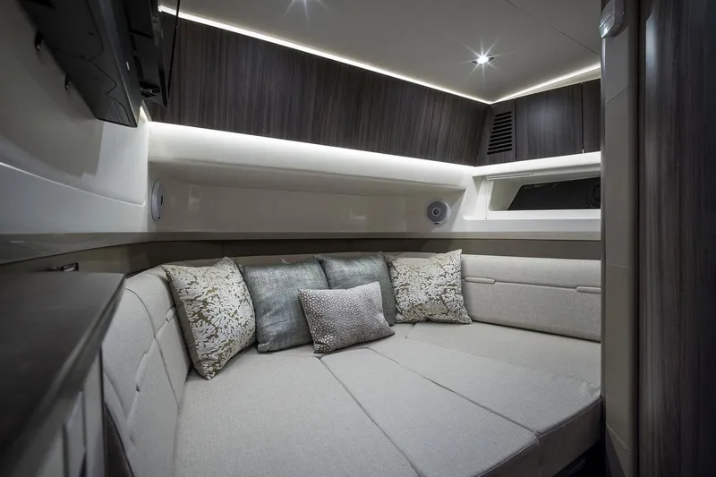  Yacht Photos Pics Manufacturer Provided Image: Luxurious interior cabin of 2022 Sea Ray SLX 400 yacht with plush seating and modern decor.