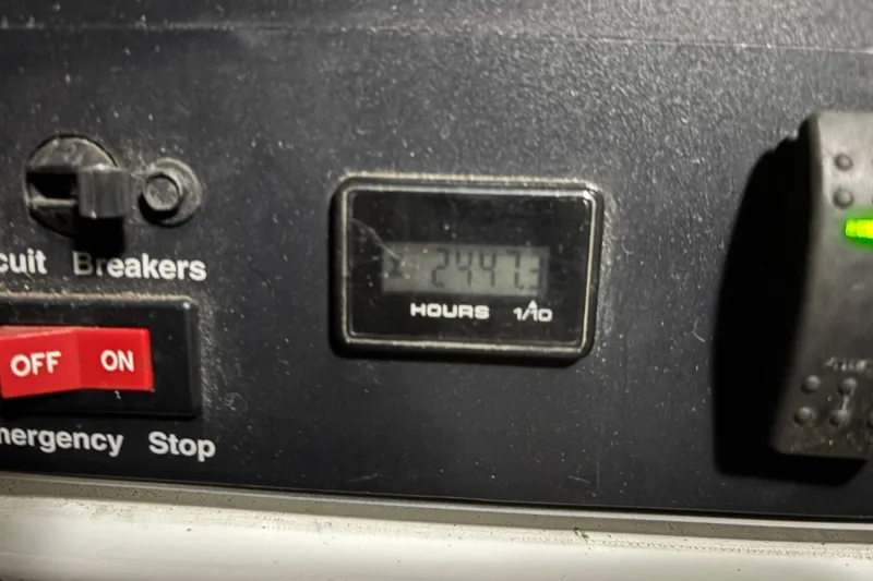Liberty Call Yacht Photos Pics Control panel of &nbsp;Onan Generator showing 2447.3 hours.
