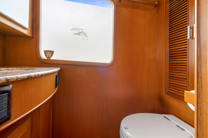  Yacht Photos Pics Luxurious wooden bathroom interior on a 2007 Fleming 65 yacht.