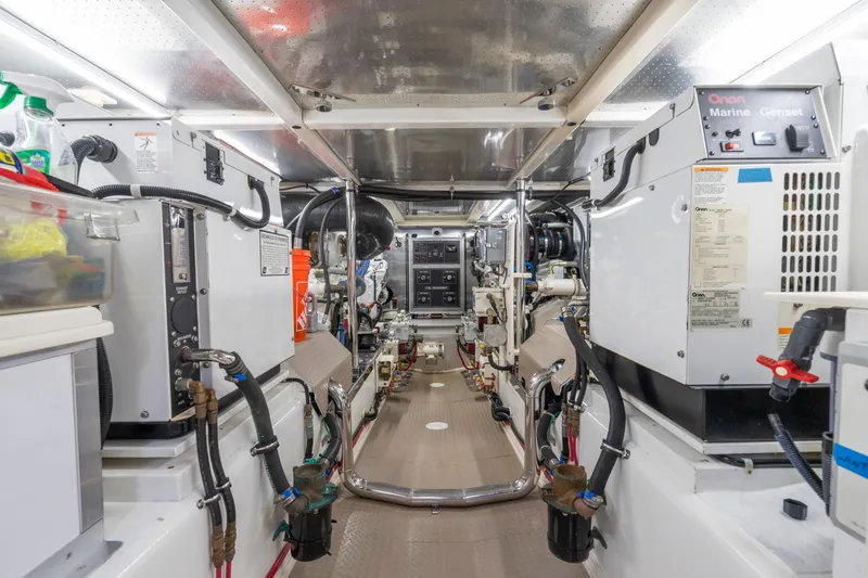  Yacht Photos Pics Engine room of a 2007 Fleming 65 yacht, showcasing machinery and equipment.