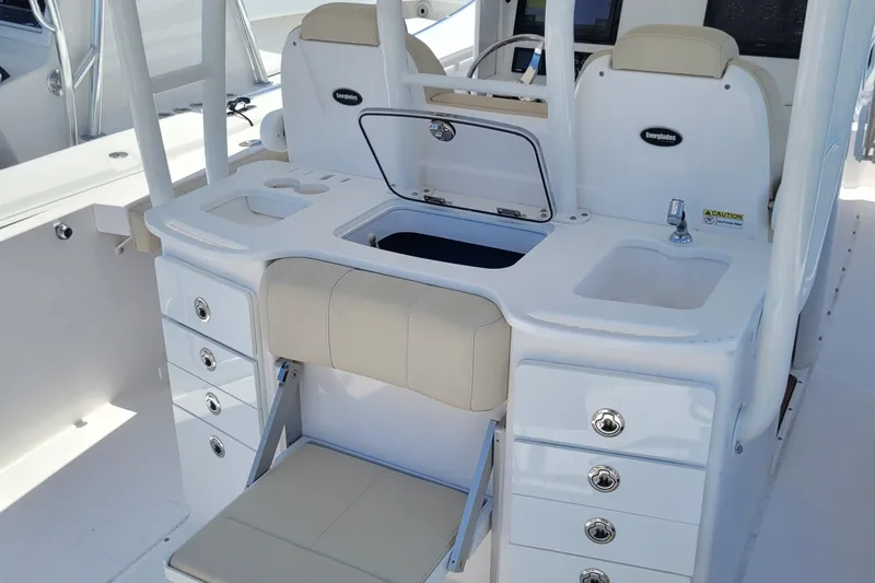  Yacht Photos Pics 2018 Everglades 355 Center Console boat interior with seating, storage, and sink.