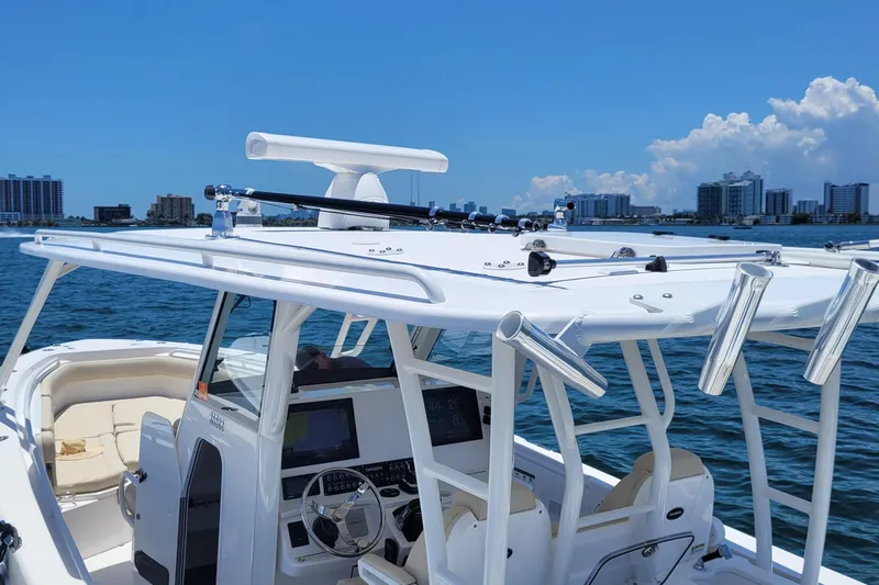  Yacht Photos Pics 2018 Everglades 355 Center Console boat on water, featuring advanced navigation equipment.