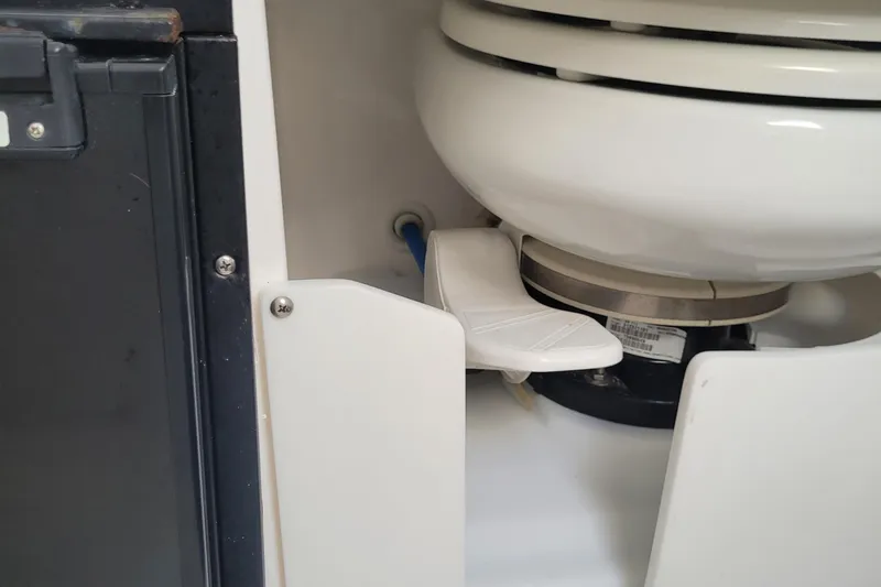  Yacht Photos Pics 2018 Everglades 355 Center Console marine toilet detail with foot pedal.