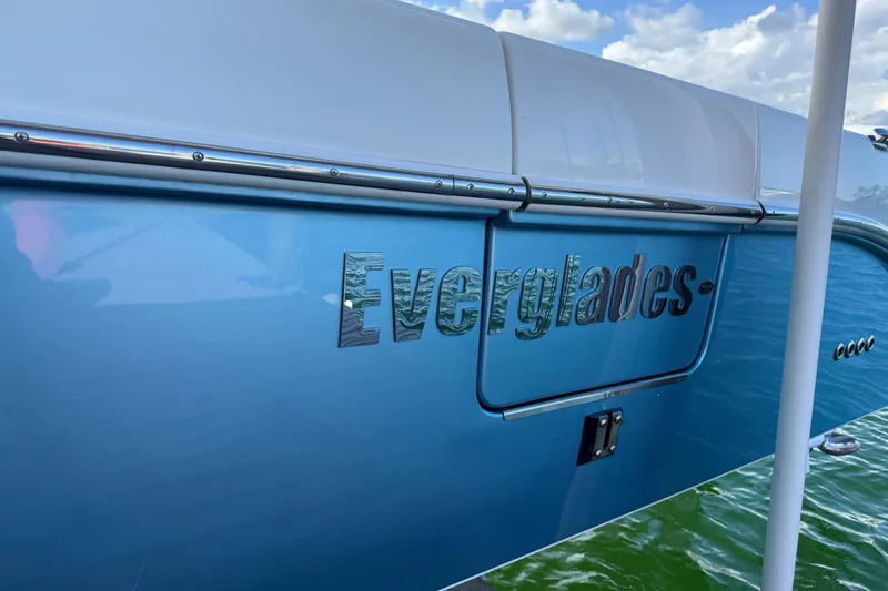  Yacht Photos Pics 2018 Everglades 355 Center Console boat with blue hull and chrome lettering.