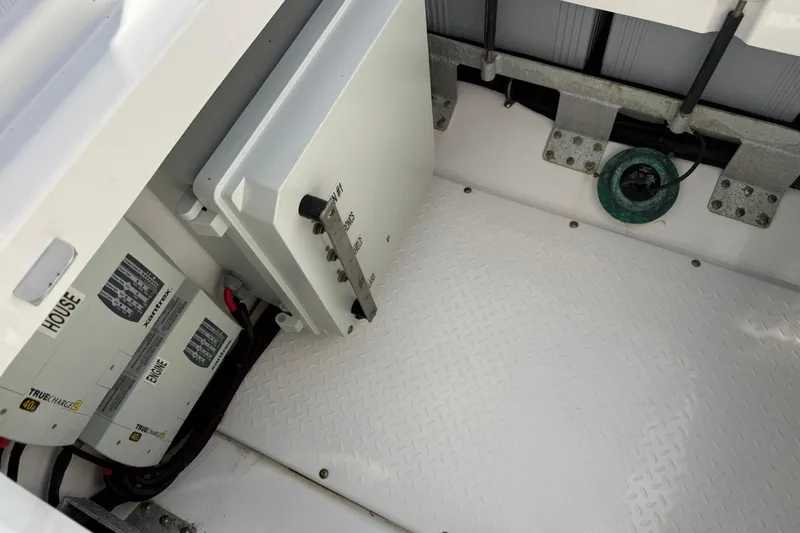  Yacht Photos Pics 2018 Everglades 355 Center Console battery compartment with electrical components and wiring.