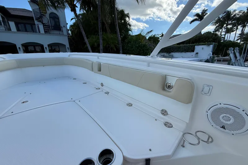  Yacht Photos Pics 2018 Everglades 355 Center Console boat interior with seating and cup holders.