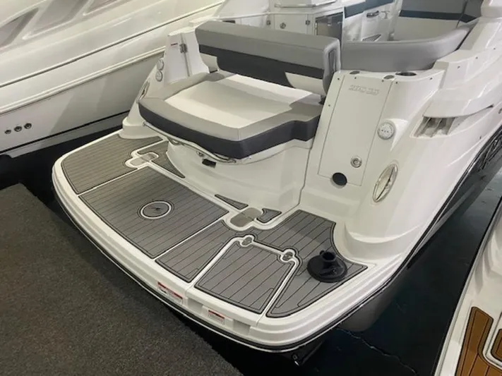  Yacht Photos Pics 2022 Monterey 295 Sport Yacht, rear view with seating and swim platform.