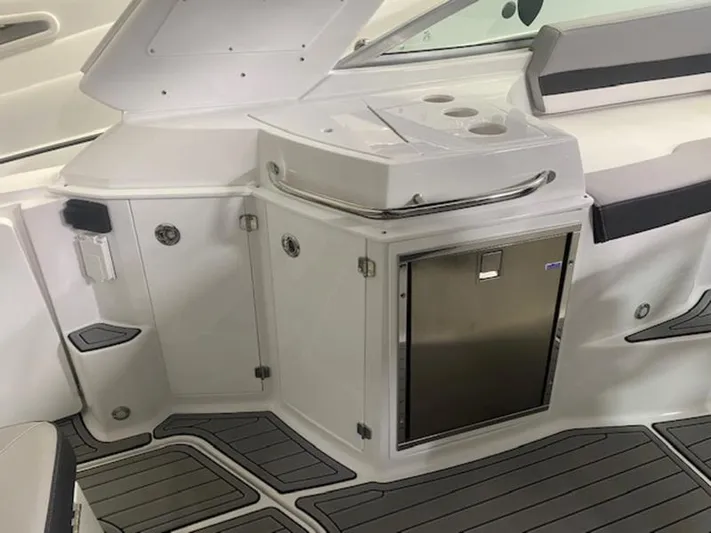  Yacht Photos Pics 2022 Monterey 295 Sport Yacht interior with sleek cabinetry and modern design.