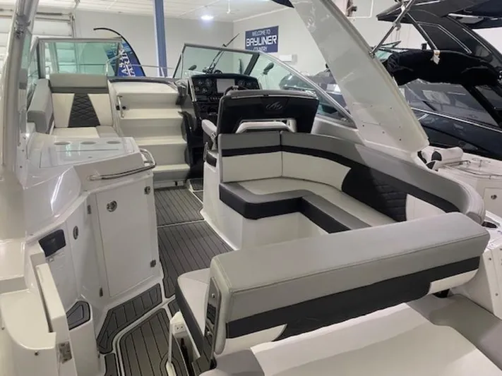  Yacht Photos Pics 2022 Monterey 295 Sport Yacht interior with sleek seating and modern design.