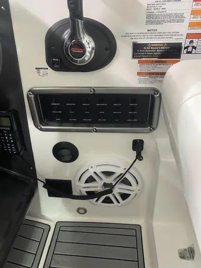  Yacht Photos Pics 2022 Monterey 295 Sport Yacht control panel with switches and speaker.