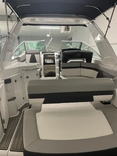  Yacht Photos Pics 2022 Monterey 295 Sport Yacht interior with modern seating and sleek design.