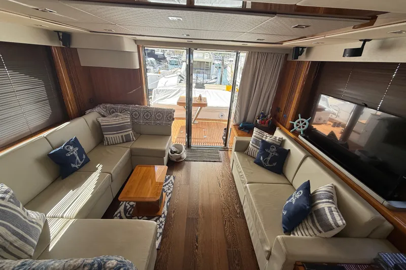 Lady A Yacht Photos Pics Luxurious interior of 2017 Sunseeker Manhattan 65 yacht with elegant seating and nautical decor.