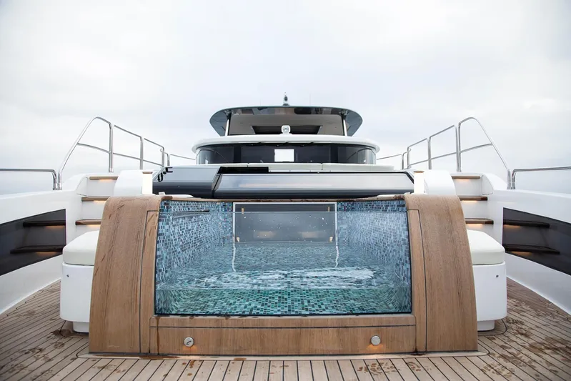  Yacht Photos Pics Luxurious 2023 Sirena 88 yacht with elegant deck and modern jacuzzi.