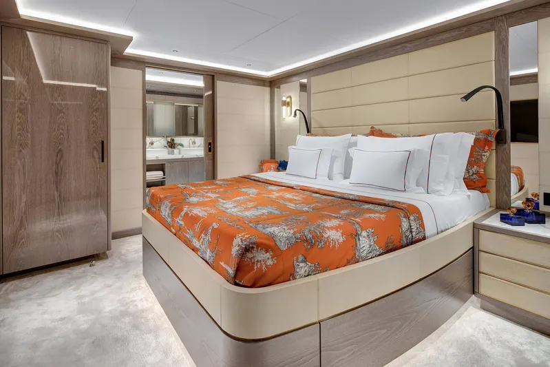  Yacht Photos Pics Luxurious bedroom interior of 2023 Sirena 88 yacht with elegant decor and modern amenities.