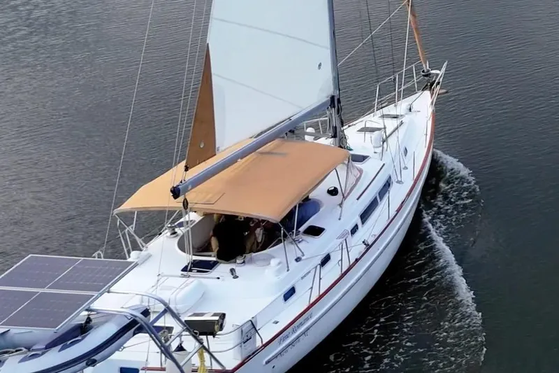 Fine Romance Yacht Photos Pics Sailing yacht Beneteau Oceanis 40 CC, 1997 model, cruising on calm waters.