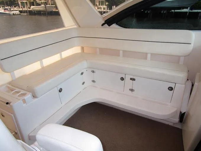 50/50 Yacht Photos Pics Curved Settee to Port with Storage Lockers Below
