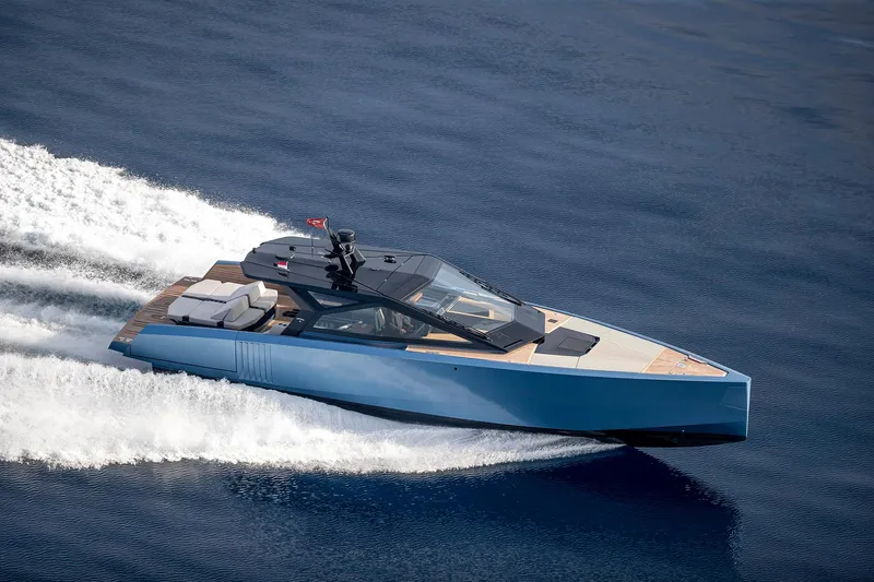  Yacht Photos Pics 2022 Wally WALLYPOWER58 yacht cruising on open water, showcasing sleek design and speed.
