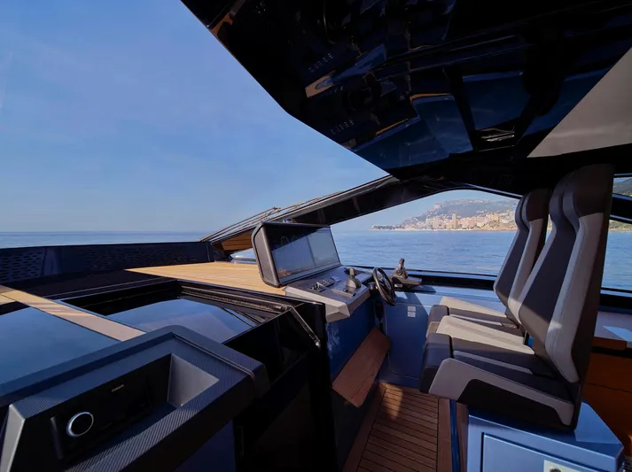  Yacht Photos Pics Luxurious 2022 Wally WALLYPOWER58 yacht interior with sleek design and modern navigation controls.