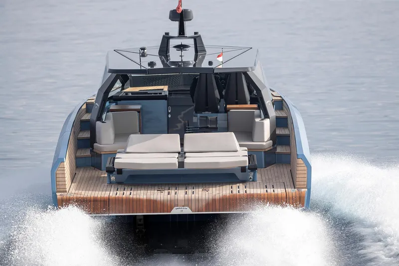  Yacht Photos Pics 2022 Wally WALLYPOWER58 yacht cruising on water, showcasing sleek design and luxury features.
