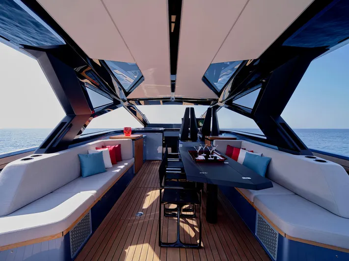 Yacht Photos Pics Luxurious 2022 Wally WALLYPOWER58 yacht interior with elegant seating and ocean view.