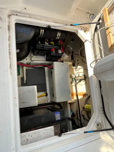  Yacht Photos Pics Engine compartment of a 1996 Bayliner 3788 Command Bridge Motoryacht, showing mechanical components and wiring.