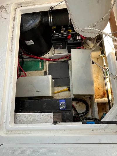  Yacht Photos Pics Engine compartment of a 1996 Bayliner 3788 Command Bridge Motoryacht, showing batteries and wiring.