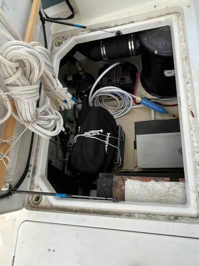  Yacht Photos Pics Engine compartment of 1996 Bayliner 3788 Command Bridge Motoryacht with ropes and equipment.