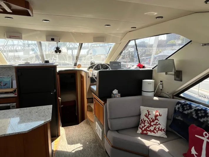  Yacht Photos Pics Interior of 1996 Bayliner 3788 Command Bridge Motoryacht with modern furnishings and helm.