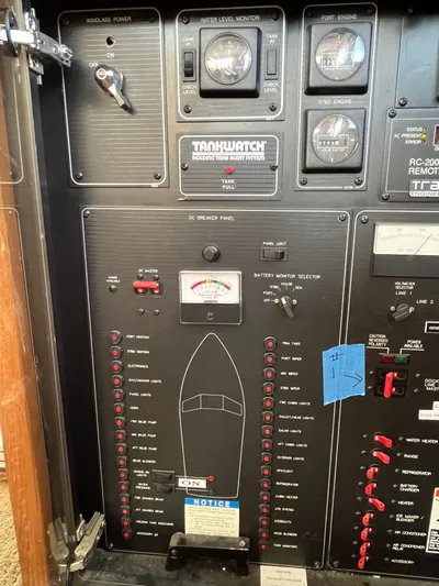  Yacht Photos Pics Control panel of a 1996 Bayliner 3788 Command Bridge Motoryacht, featuring gauges and switches.