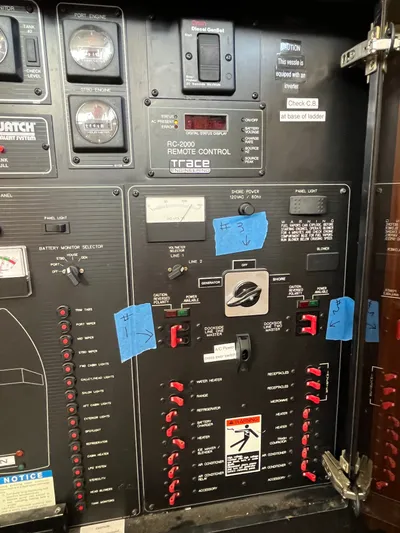  Yacht Photos Pics Electrical control panel of a 1996 Bayliner 3788 Command Bridge Motoryacht with labeled switches.