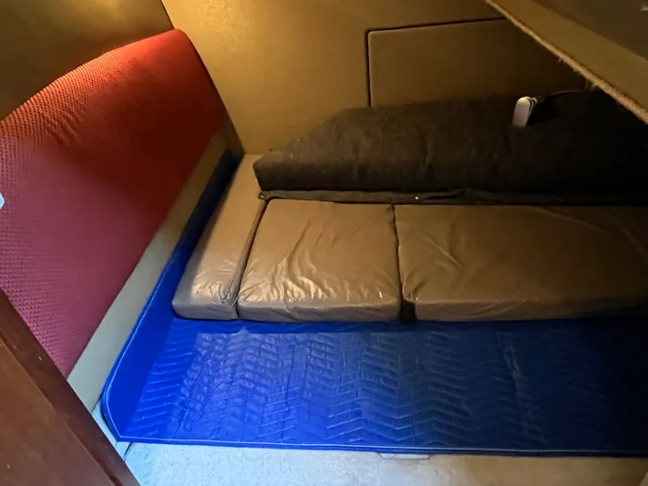  Yacht Photos Pics Interior cabin of 1996 Bayliner 3788 Command Bridge Motoryacht with cushioned seating.