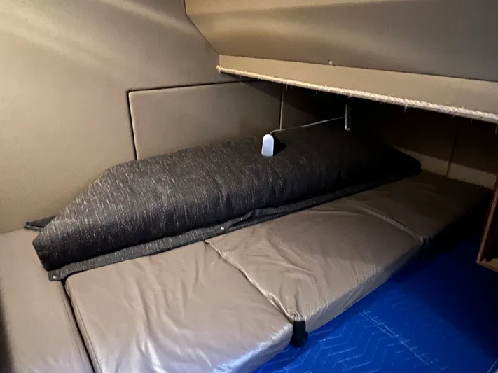  Yacht Photos Pics Interior cabin of 1996 Bayliner 3788 Command Bridge Motoryacht with cushioned seating.