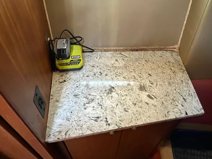  Yacht Photos Pics Marble countertop with Ryobi charger on 1996 Bayliner 3788 Command Bridge Motoryacht.