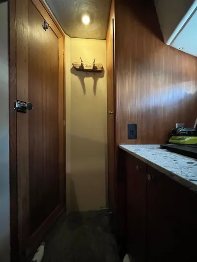  Yacht Photos Pics Interior of 1996 Bayliner 3788 Command Bridge Motoryacht with wooden cabinetry and ambient lighting.