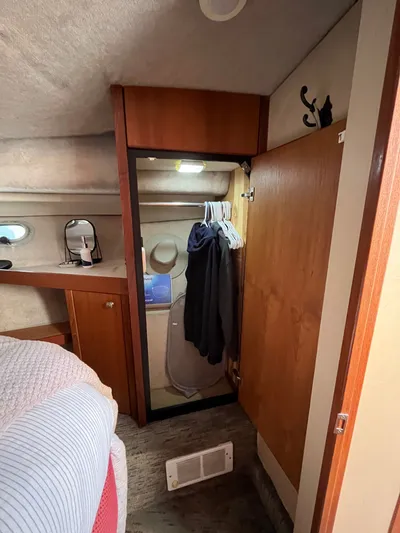  Yacht Photos Pics Interior of 1996 Bayliner 3788 Motoryacht showing closet and cabin details.