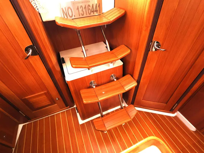  Yacht Photos Pics Interior of 2021 Catalina C355 yacht with wooden steps and flooring.