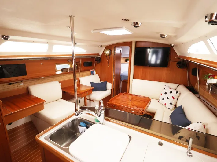  Yacht Photos Pics Luxurious interior of 2021 Catalina C355 yacht with modern amenities and elegant wood finish.