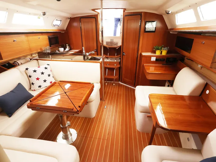  Yacht Photos Pics Luxurious Catalina C355 2021 yacht interior with wooden finish and comfortable seating.