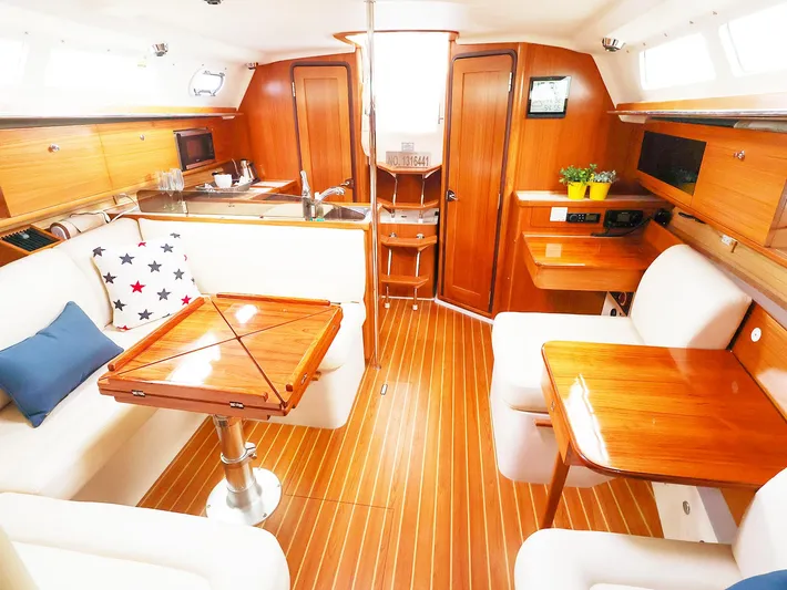  Yacht Photos Pics Luxurious interior of 2021 Catalina C355 yacht with wooden furnishings and modern amenities.