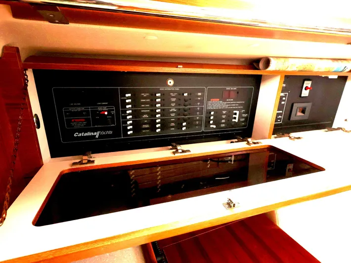  Yacht Photos Pics Electrical panel inside a 2021 Catalina C355 sailboat, featuring various switches and controls.