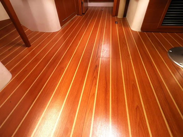  Yacht Photos Pics Polished wooden flooring inside a 2021 Catalina C355 yacht cabin.