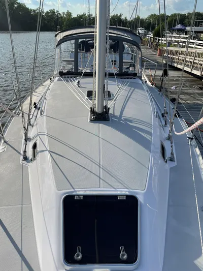  Yacht Photos Pics Sleek 2021 Catalina C355 sailboat docked, showcasing its modern deck design and rigging.
