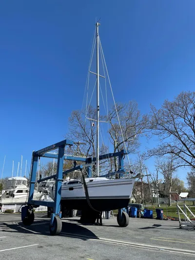  Yacht Photos Pics Catalina C355 sailboat on a lift, clear blue sky, 2021 model.