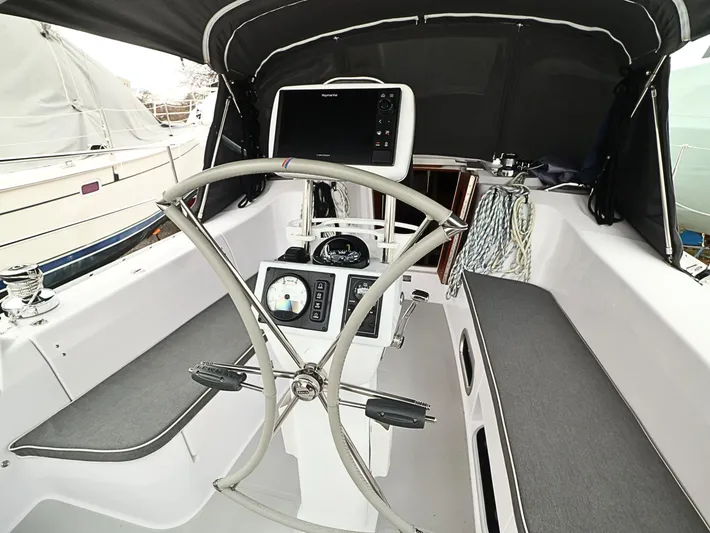  Yacht Photos Pics Cockpit of 2021 Catalina C355 sailboat with steering wheel and navigation equipment.