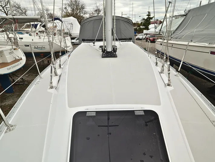  Yacht Photos Pics Catalina C355 sailboat deck, 2021 model, docked among other boats.