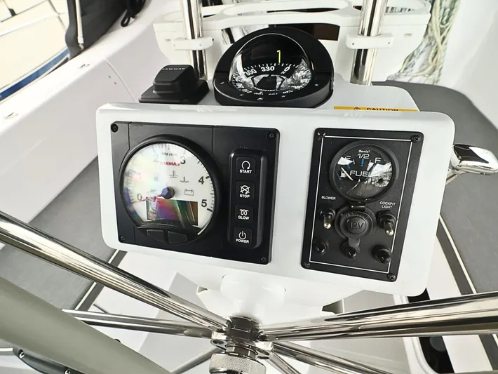  Yacht Photos Pics Steering console of 2021 Catalina C355 sailboat with navigation instruments and controls.