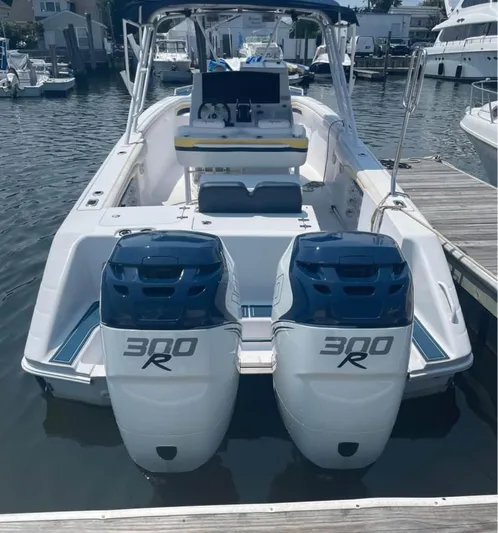  Yacht Photos Pics 2004 Donzi 35 ZF boat with twin 300R engines docked at marina.