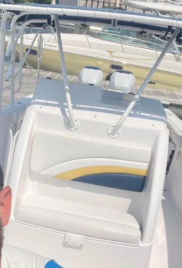  Yacht Photos Pics 2004 Donzi 35 ZF boat interior with white seating and colorful accents.