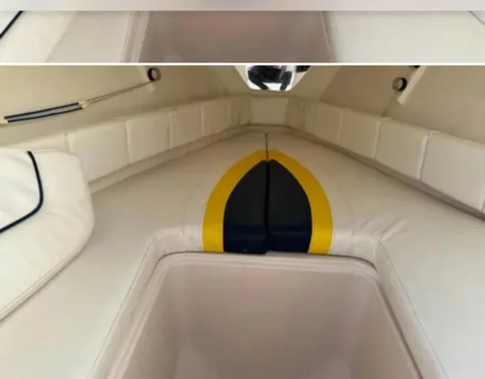  Yacht Photos Pics Interior of 2004 Donzi 35 ZF boat with white and yellow seating.